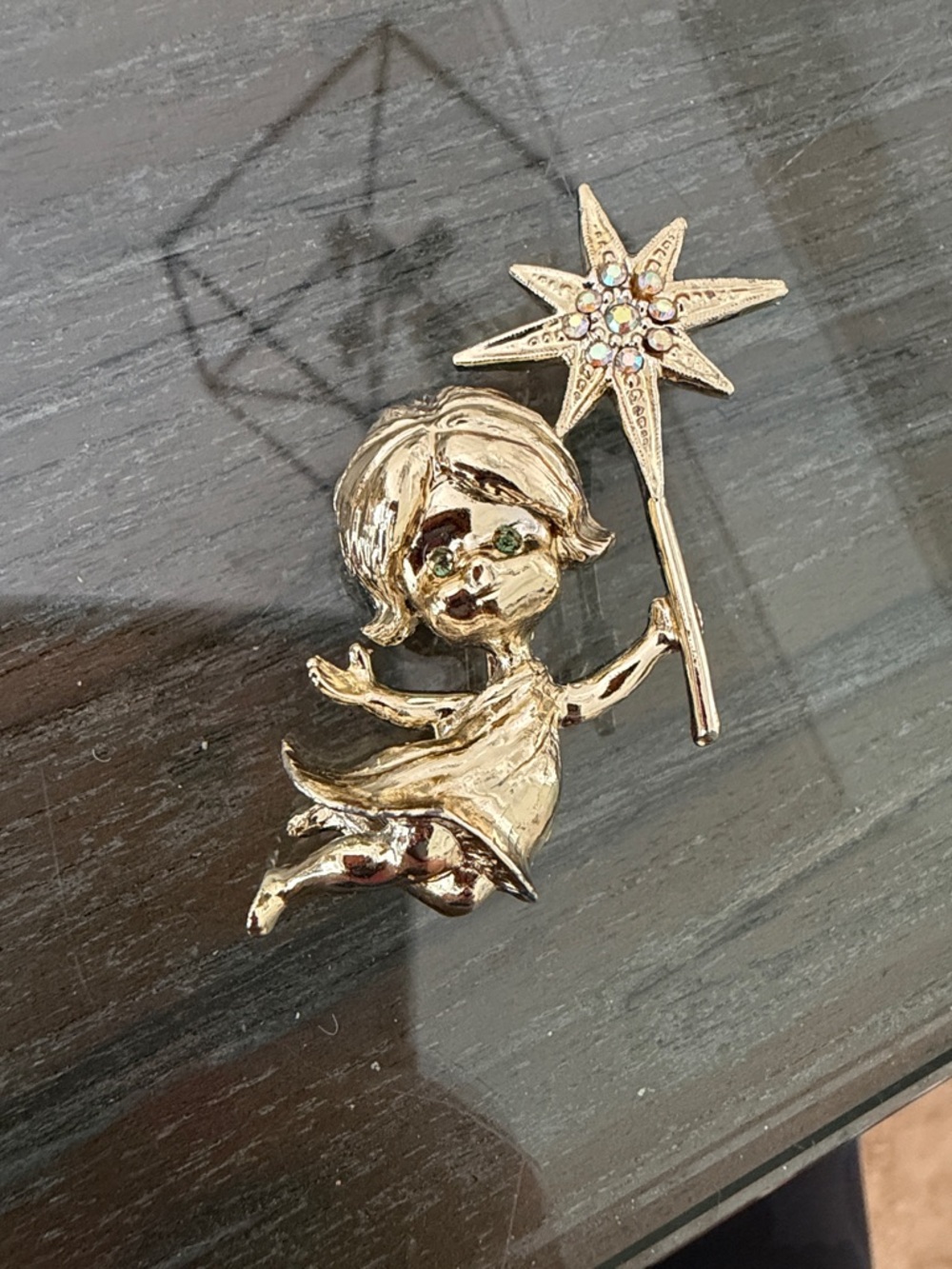TANCER II brooch, an angel holding a rhinestone-studded star wand